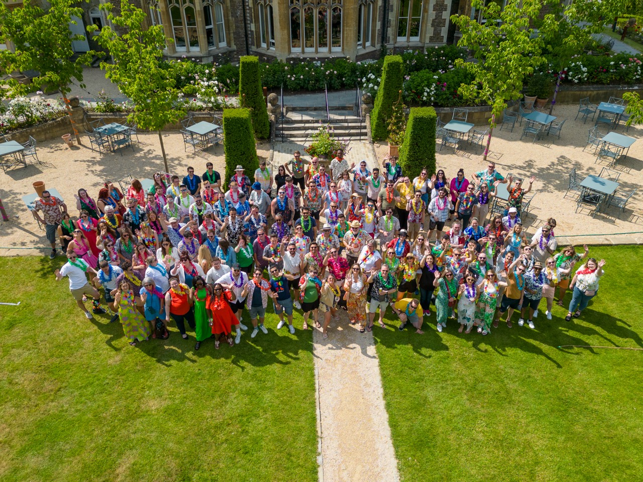 A large group of Sonovate colleagues gathered outdoors