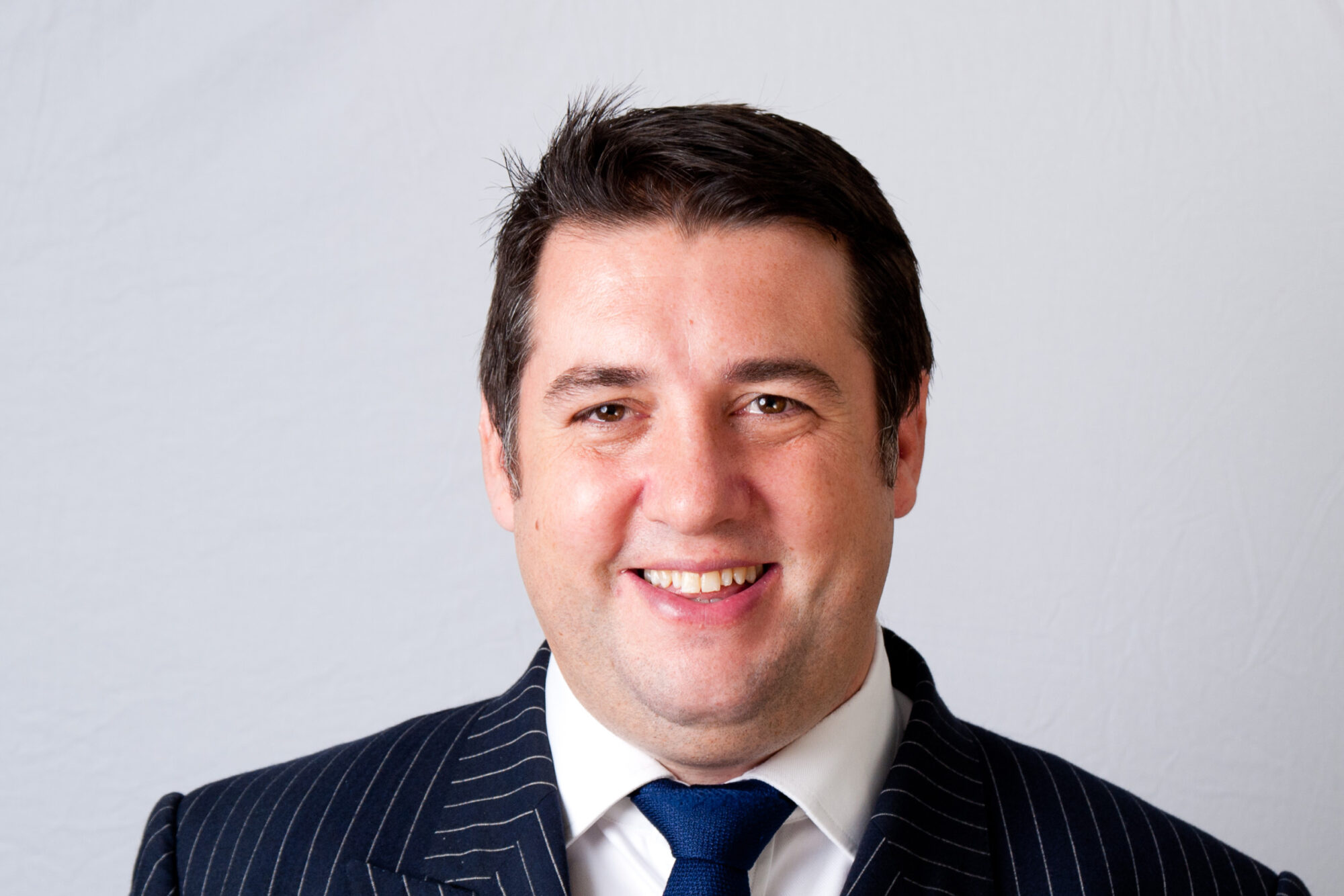 colour headshot of Toby Babb (Harrington Starr) colour headshot of Toby Babb (Harrington Starr)